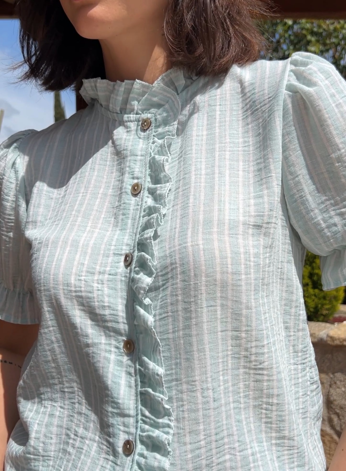 Aqua green striped shirt
