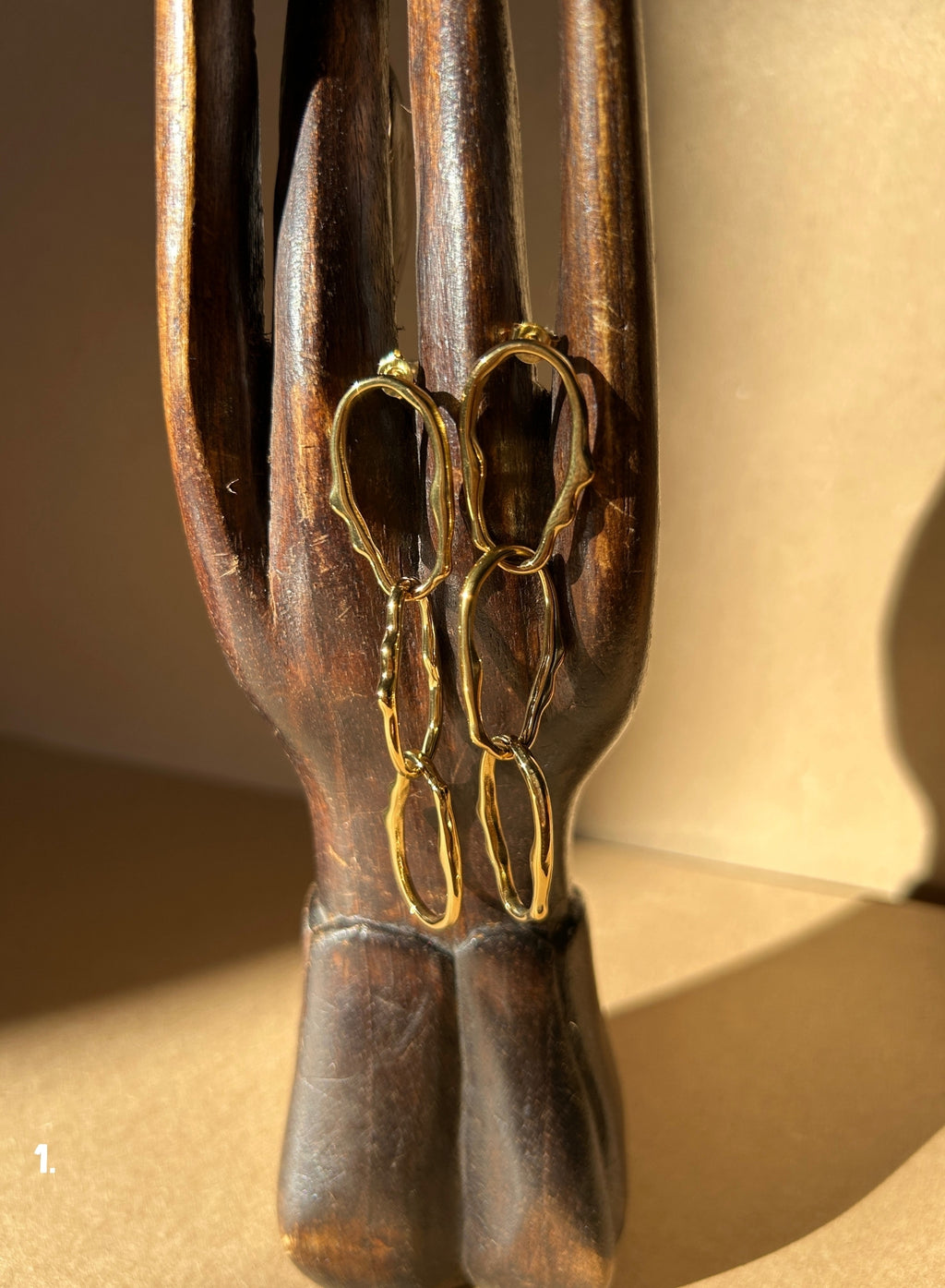 Pendiente eslabón triple