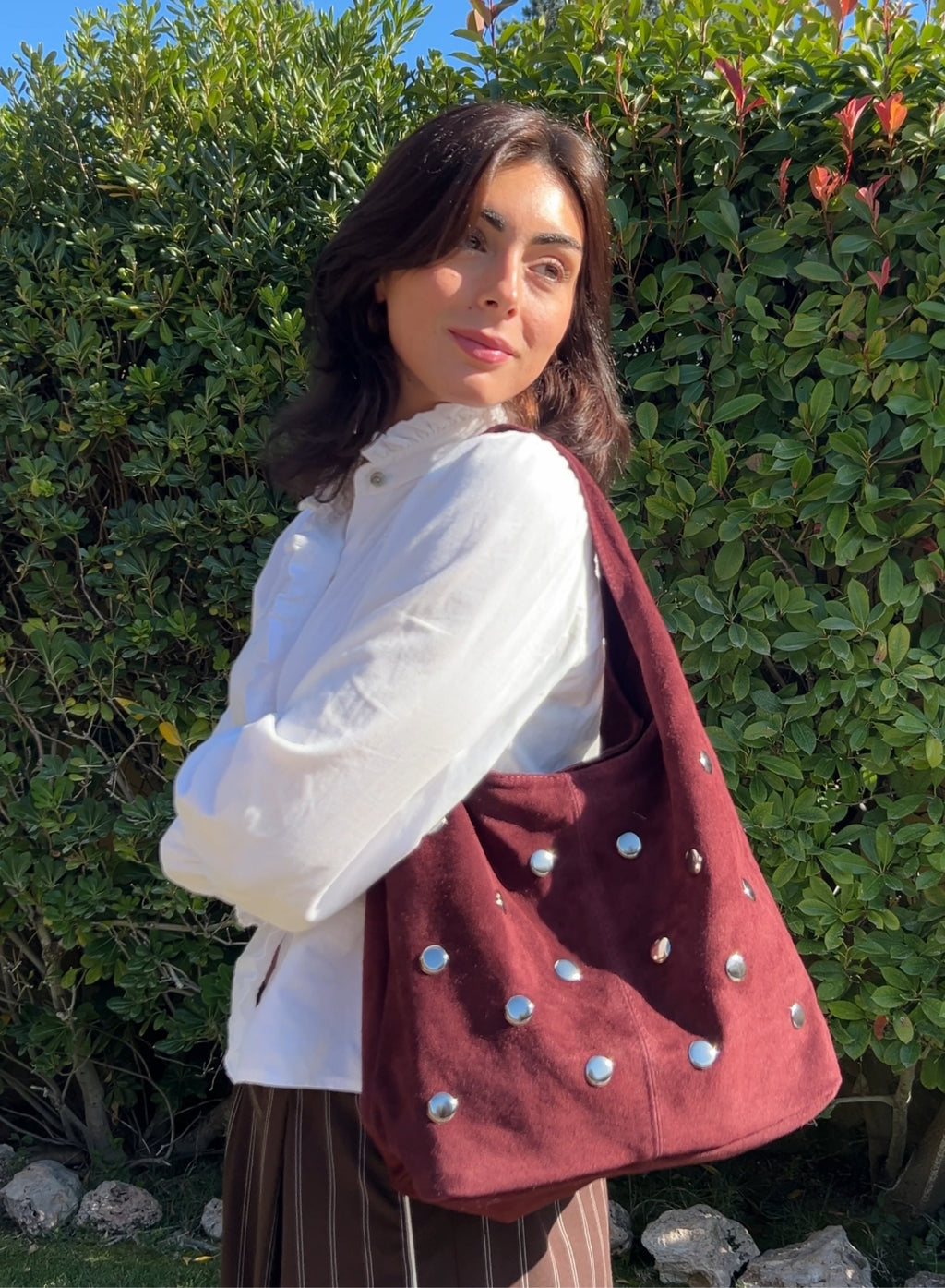 Bolso saco tachuelas