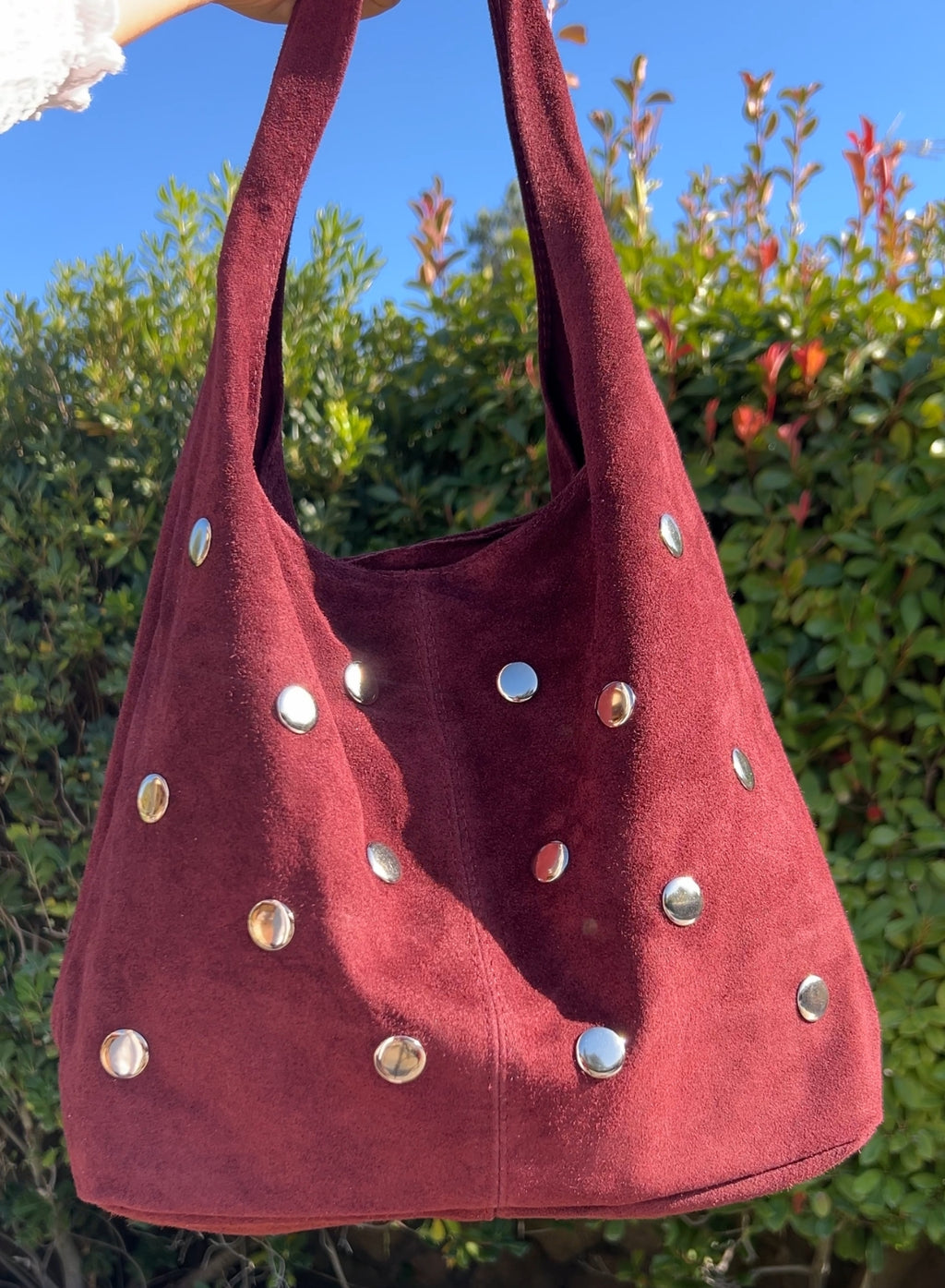 Bolso saco tachuelas