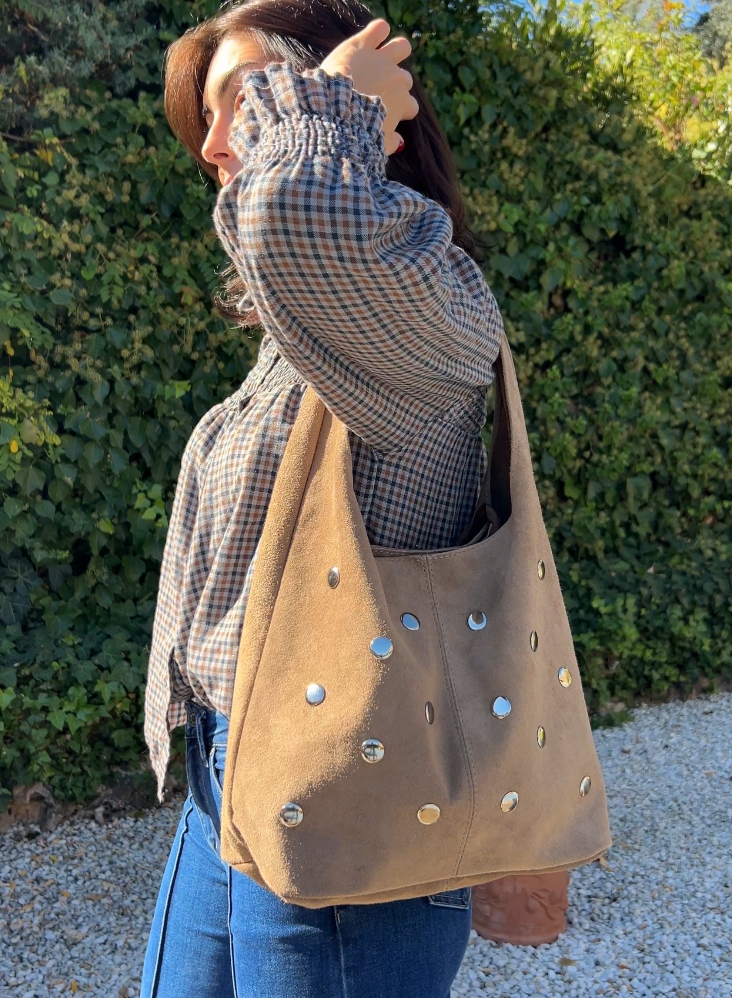 Bolso saco tachuelas