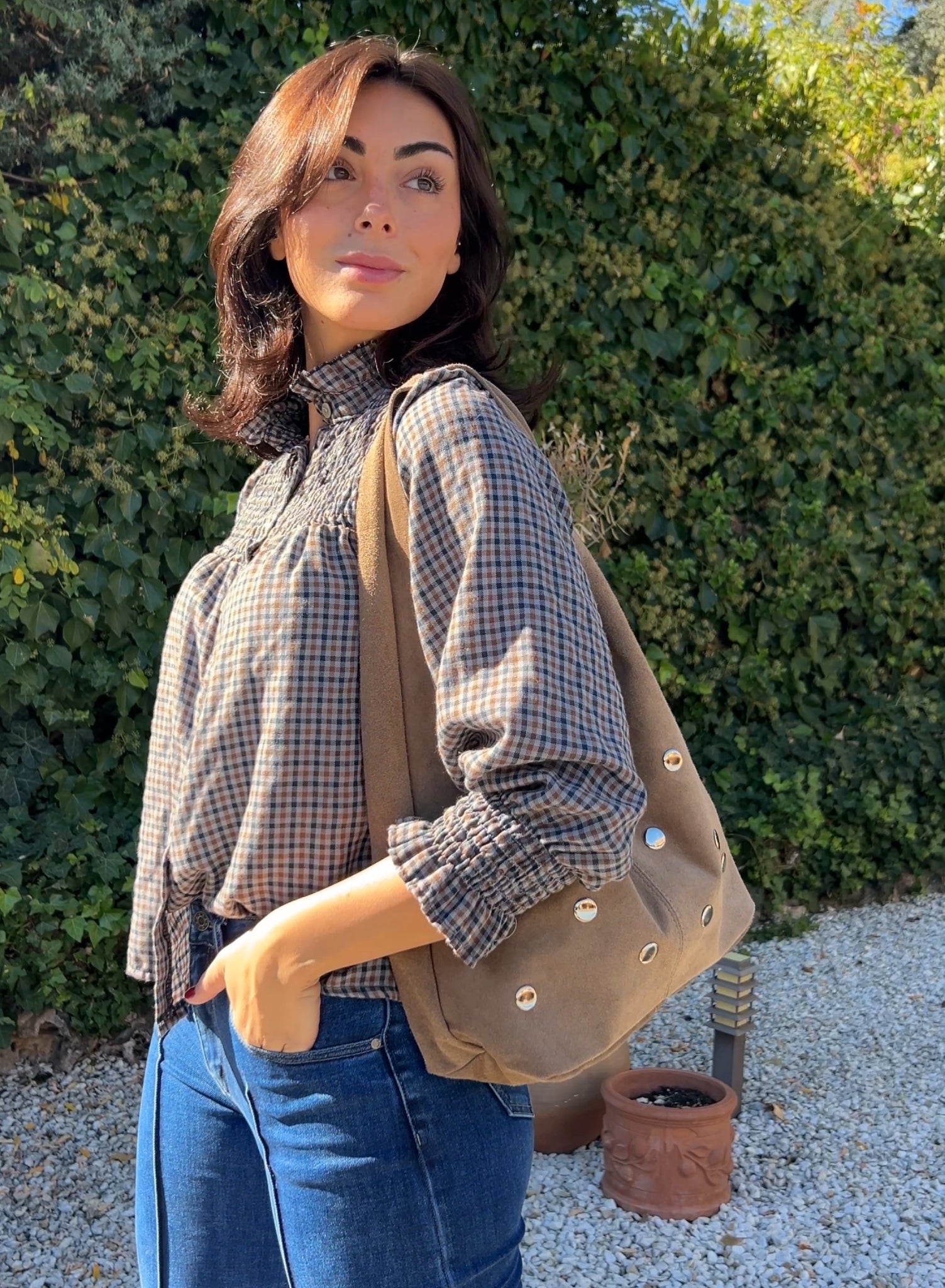 Bolso saco tachuelas