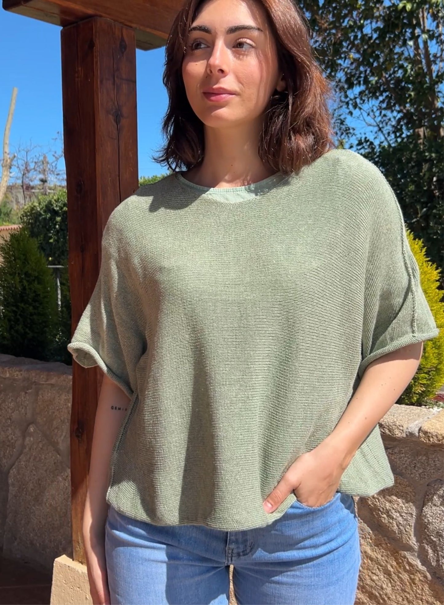 Thin green sweater