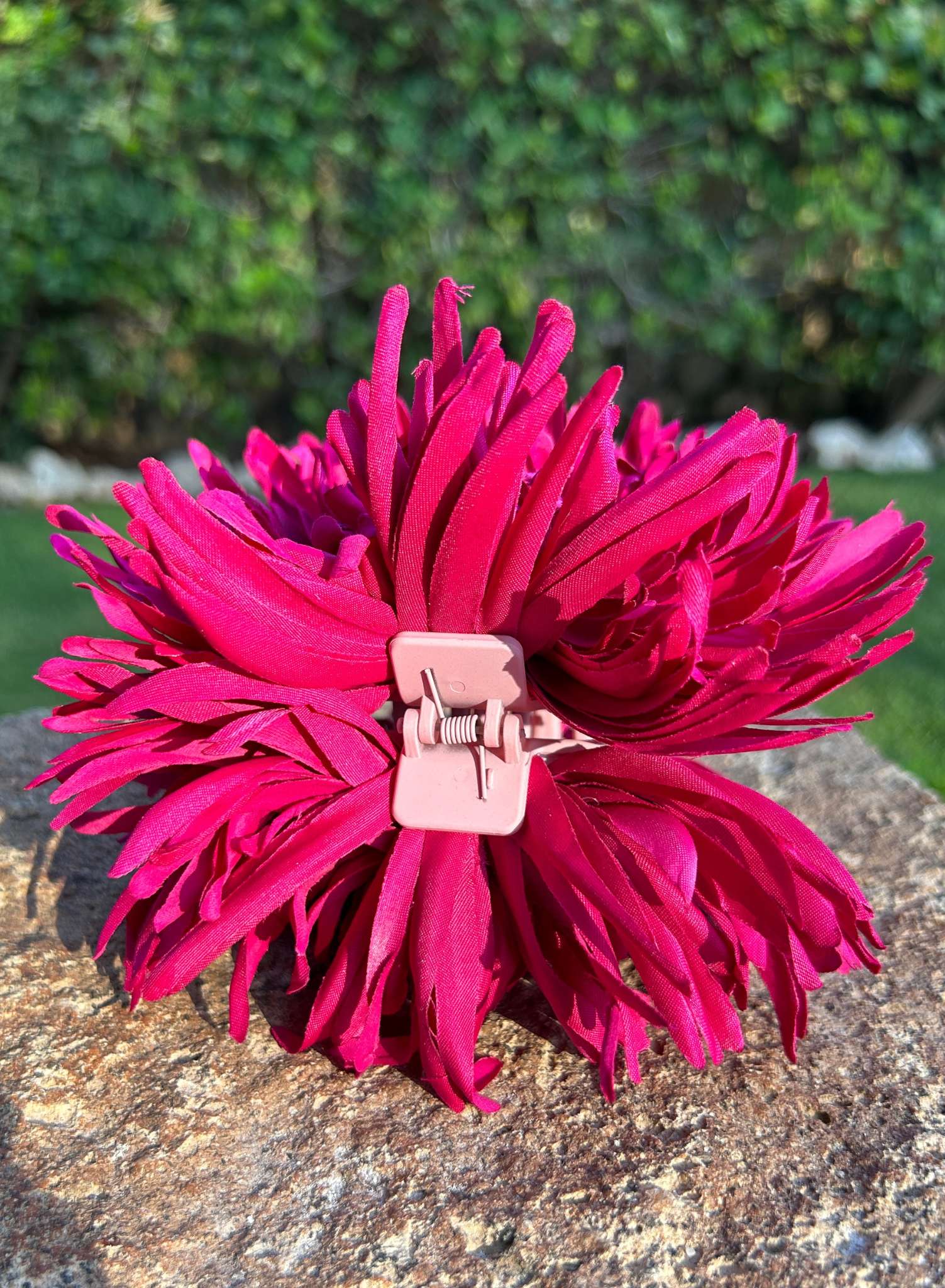 Pinza flor fucsia