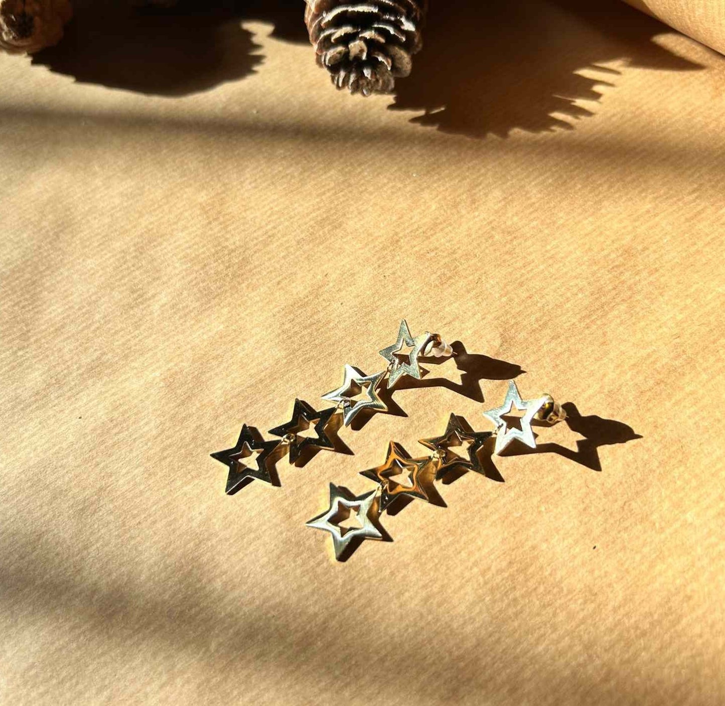Gold star earrings