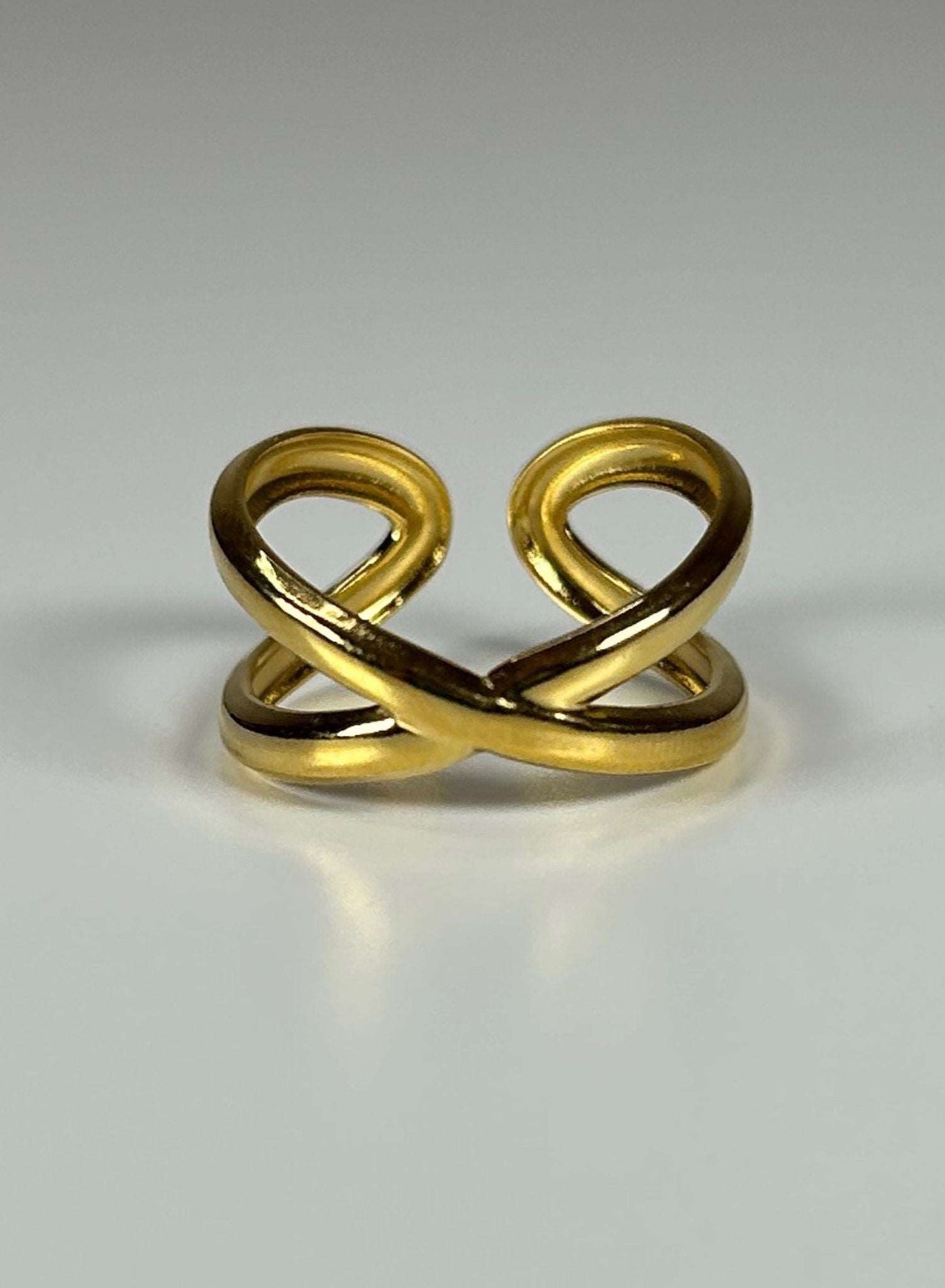 Anillo cruzado dorado