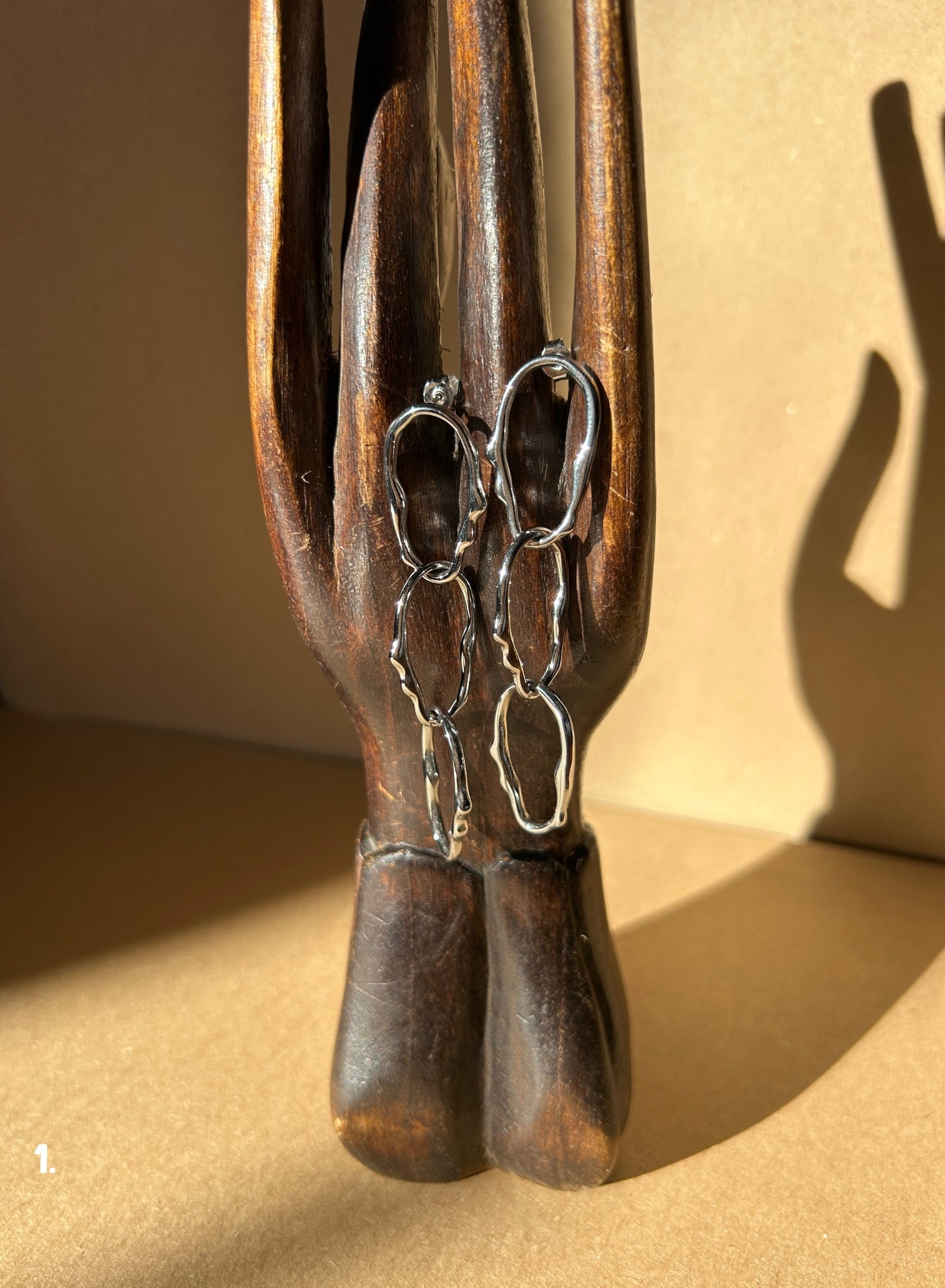 Pendiente eslabón triple